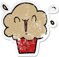 distressed sticker of a cartoon cupcake png