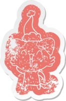 waving little dog quirky cartoon distressed sticker of a wearing santa hat png