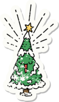 worn old sticker of a tattoo style happy christmas tree png