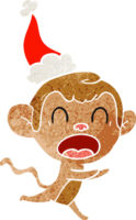 en criant main tiré rétro dessin animé de une singe portant Père Noël chapeau png