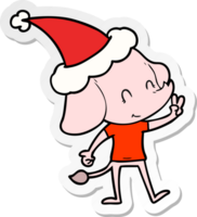 mignonne main tiré autocollant dessin animé de une l'éléphant portant Père Noël chapeau png