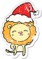 hand drawn distressed sticker cartoon of a lion wearing santa hat png