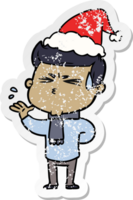 hand drawn distressed sticker cartoon of a man sweating wearing santa hat png