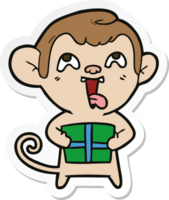 sticker of a crazy cartoon monkey with christmas present png
