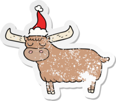 mano dibujado afligido pegatina dibujos animados de un toro vistiendo Papa Noel sombrero png