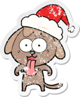 cute hand drawn distressed sticker cartoon of a dog wearing santa hat png