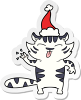 main tiré autocollant dessin animé de une blanc tigre portant Père Noël chapeau png
