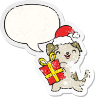 cute cartoon puppy with christmas present and hat with speech bubble distressed distressed old sticker png
