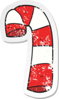 retro distressed sticker of a cartoon candy cane png