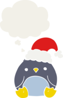 cute cartoon penguin wearing christmas hat and thought bubble in retro style png