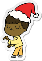 sticker cartoon of a grumpy boy wearing santa hat png