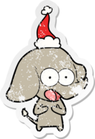 cute distressed sticker cartoon of a elephant wearing santa hat png