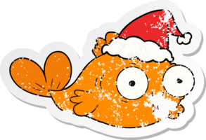 happy goldfish distressed sticker cartoon of a wearing santa hat png