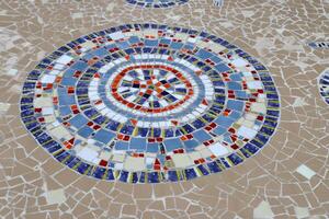 1 Ceramic marble mosaic. Concrete products covered with small ceramic tiles photo