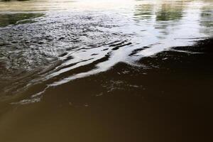 The color of water in the Mediterranean Sea in shallow water. Natural abstract background. photo