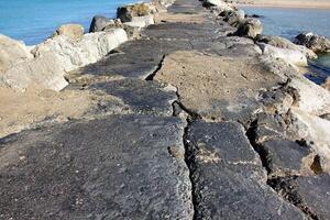 Stones in a city park on the shores of the Mediterranean Sea. photo