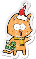 funny distressed sticker cartoon of a cat wearing santa hat png