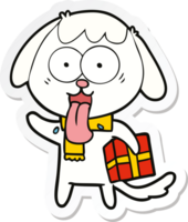 sticker of a cute cartoon dog with christmas present png