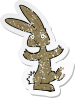 retro distressed sticker of a cartoon rabbit png