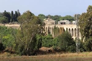 An ancient aqueduct for supplying water to populated areas. photo