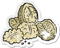 distressed sticker of a cartoon walnuts png