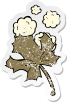 retro distressed sticker of a cartoon old leaf png