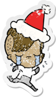 verontruste sticker cartoon van een huilend meisje dat ruimtekleren draagt met een kerstmuts png