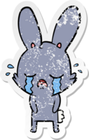 distressed sticker of a cute cartoon rabbit crying png