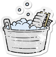 distressed sticker of a cartoon old washboard and bucket png