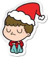 main tiré autocollant dessin animé de une grincheux garçon portant Père Noël chapeau png