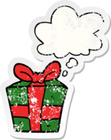 cartoon present with thought bubble as a distressed worn sticker png