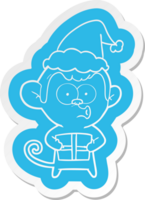 quirky cartoon  sticker of a christmas monkey wearing santa hat png