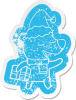 quirky cartoon distressed sticker of a bear with present wearing santa hat png