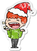 hand drawn distressed sticker cartoon of a laughing man wearing santa hat png