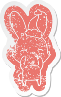 curious bunny quirky cartoon distressed sticker of a wearing santa hat png