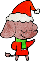 main tiré texturé dessin animé de une souriant l'éléphant portant écharpe portant Père Noël chapeau png