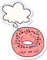 cartoon donut with thought bubble as a printed sticker png