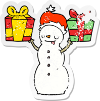 distressed sticker of a cartoon snowman with present png