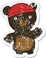 autocollant rétro en détresse d'un ours noir de dessin animé portant un chapeau png