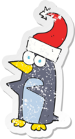retro distressed sticker of a cartoon christmas penguin png