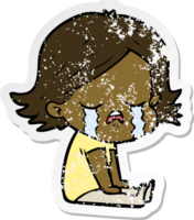 distressed sticker of a cartoon girl crying sat on floor png