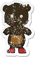 autocollant rétro en détresse d'un ours en peluche heureux de dessin animé en bottes png