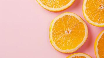 Orange fruits top view on the pastel background photo