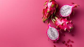 Dragon fruits healthy food top view on the pastel background photo
