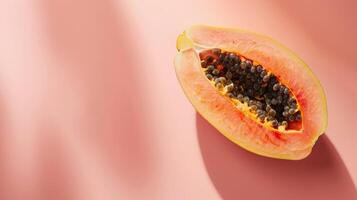 Papaya fruits top view on the pastel background photo