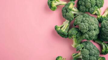 Broccoli vegetables healthy food top view on the pastel background photo