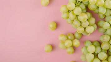 Grape fruits top view on the pastel background photo