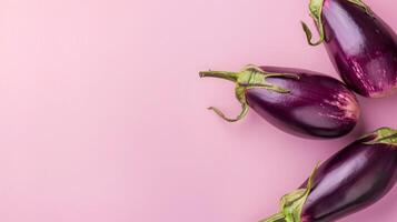 Eggplant vegetables healthy food top view on the pastel background photo