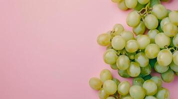 Grape fruits top view on the pastel background photo