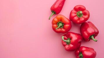 Pepper vegetable top view on the pastel background photo